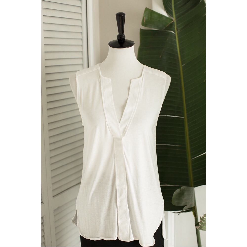 Sleeveless white tunic top